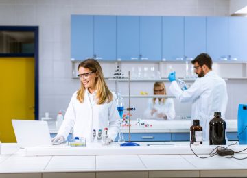 Scientists working in a laboratory, engaging in advanced research and development for bacteriophage solutions.